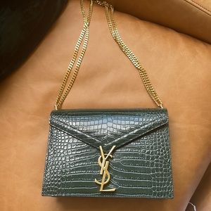 Green YSL purse. Dust bag. And box.
